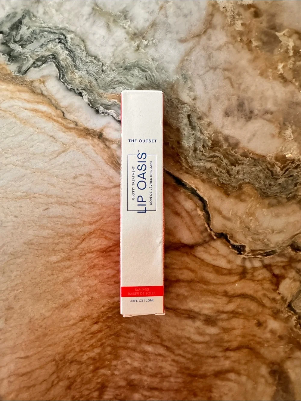 The Outset Lip Oasis Glossy Treatment — Sun Kiss (Red)